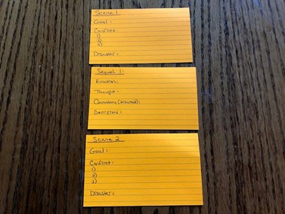 Index Cards I am a big fan of using index cards to brainstorm or plot my stories, especially when I teach classes on how to use Scene & Sequel to move your story forward. We lay out a series of index cards on the table, like dominoes, to map out the sequence of our scenes using one card for the components of the point-of view character’s Scene, followed by another card for the Sequel, detailing the reaction to the scene.